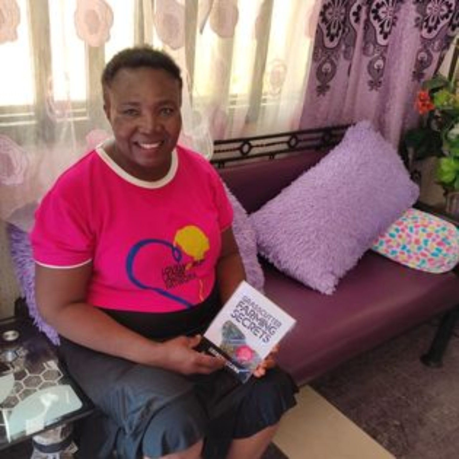 Reader holding their copy of Grasscutter Farming Secrets