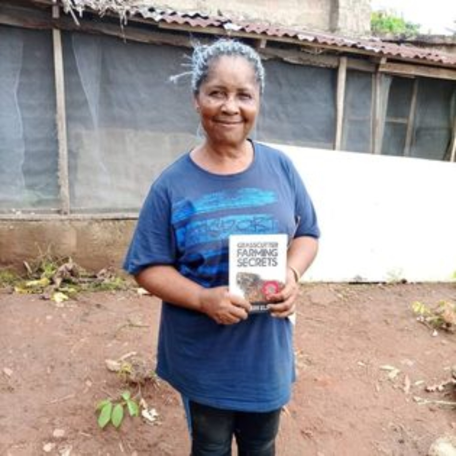 Reader holding their copy of Grasscutter Farming Secrets